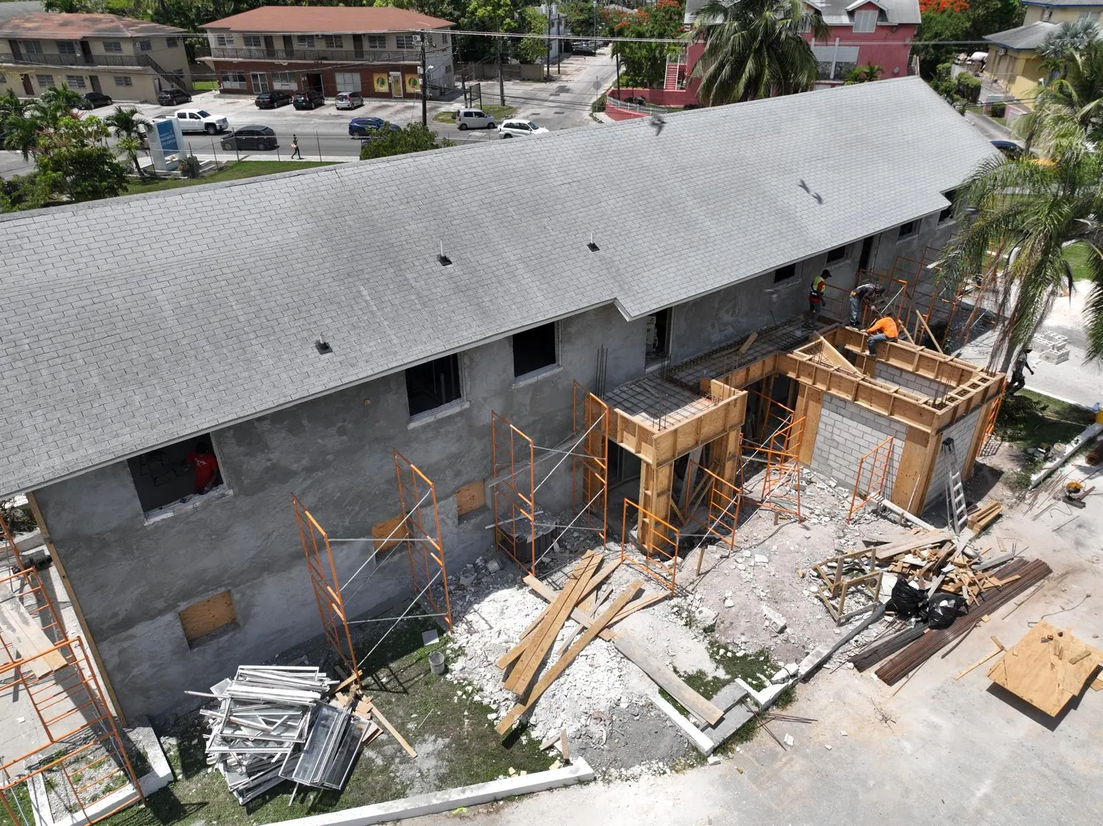 Crew forming a new concrete entry on a commercial renovation